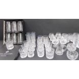 Cut glassware comprising: a boxed set of six Royal Doulton highballs (15 cm high); 5 sets of