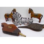 Five decorative ornamental wares: two painted wooden horses; two pairs of bellows; a large glazed