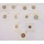 Eleven individually sleeved silver coins with collector's rating: 1 x 1914 florin; 6 x shillings (