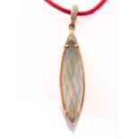 A 9-carat gold and crystal pendant