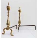A pair of neoclassical-style brass andirons: baluster turned uprights surmounted with an urn finial,