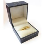 A silver-gilt dress ring modelled as concentric gadrooning, ring size M (boxed)