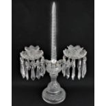 A fine quality cut-glass two-light candelabra table lustre: hand-cut faceted droplets (marked