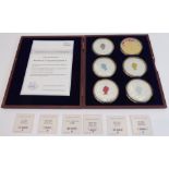 A six-medallion set, 'Monarchy of Queen Elizabeth II', in its wooden case and complete with
