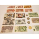 A selection of English bank notes to include: 7 ten shilling notes, three £1 notes and a facsimile