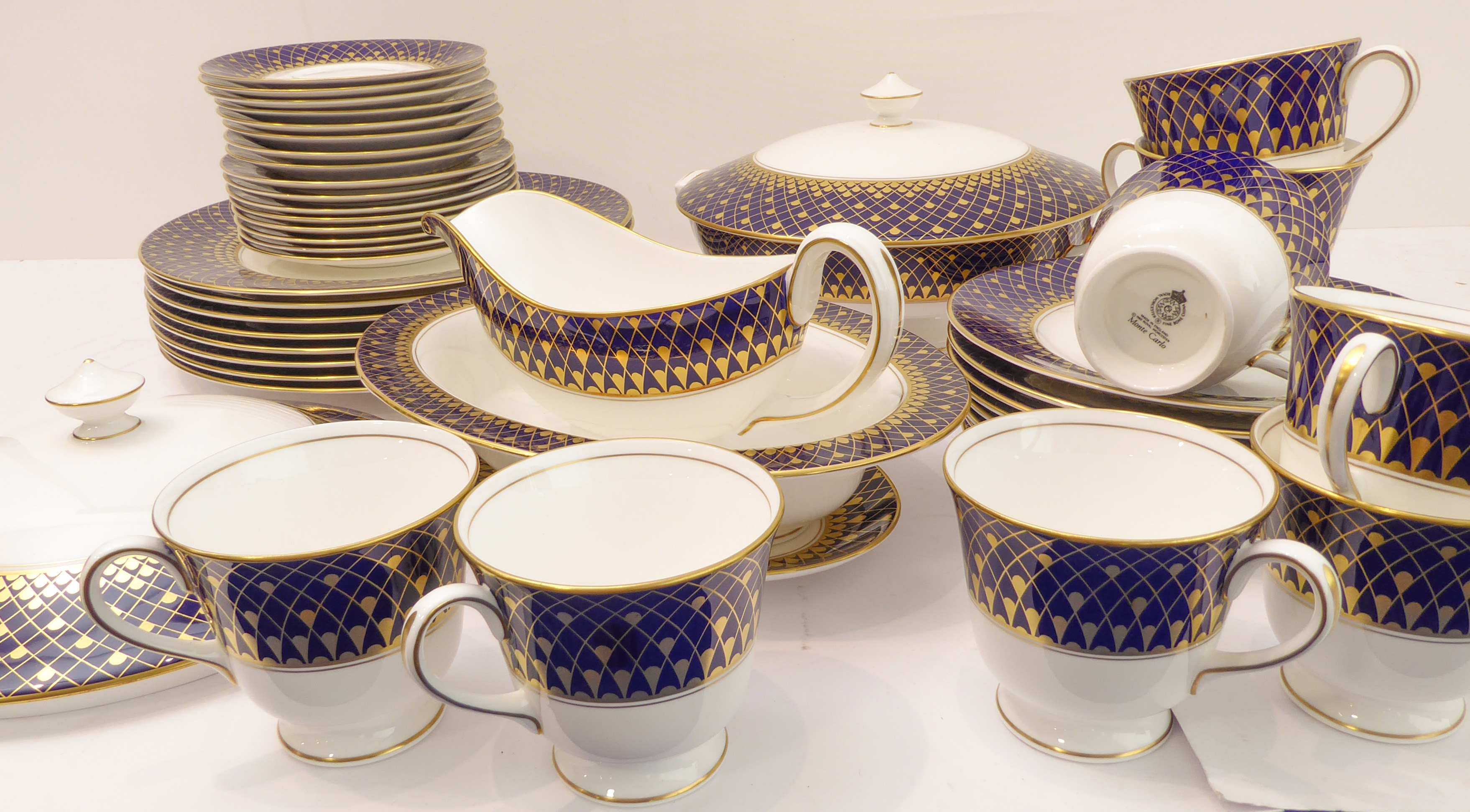 A fine Royal Worcester bone china dinner and tea service in the Monte Carlo pattern comprising: