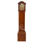 A 1930s oak-cased eight-day grandmother clock: silvered chapter ring with Roman numerals and flanked