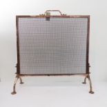 A stylish early 20th century bronze-coloured mesh fire-screen in Arts & Crafts style (65 cm wide x