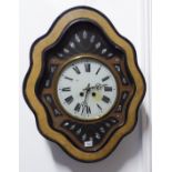 An unusual 19th century quatrefoil-shaped wall-hanging eight-day wall clock with mother of pearl