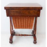 An early 19th century mahogany work-table: the hinged foldover top with green baize (as a card