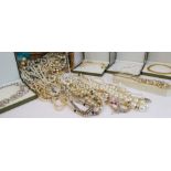 A very large quantity of costume jewellery (some boxed) to include: necklaces, pearls and others