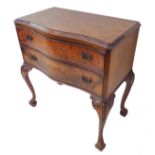A serpentine-fronted burr walnut two-drawer side table: raised on cabriole legs carved at the