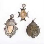 Three late 19th century silver-gilt pendant medals: 'Shepherd-Cross & Bridgeman Cup Competition