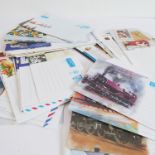 Seventy pre-paid Royal Mail airmail envelopes: 67 commemorative and illustrated, and 3 standard.