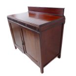 An early 20th century mahogany side-cabinet: galleried back above fluted frieze headed with five