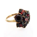 A 9-carat gold and garnet cluster ring, size H