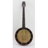 An early 20th century rosewood four-string banjo (Ideal model 8) with 'The New Windsor,