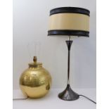 Two table lamps: a large brass lamp base with incised decorative bands (approx. 30 cm high excl.