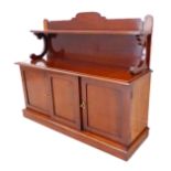 A 19th century mahogany miniature chiffonier of fine quality: the galleried back with shelf; central