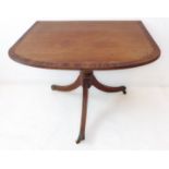 One half of a Regency-style mahogany and coromandel-crossbanded dining table (now as a console