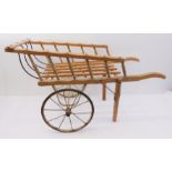 A circa 1930s child's wooden and iron handcart (95 x 41 x 55 cm)