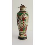 A late 19th or early 20th century Chinese crackleware vase and cover