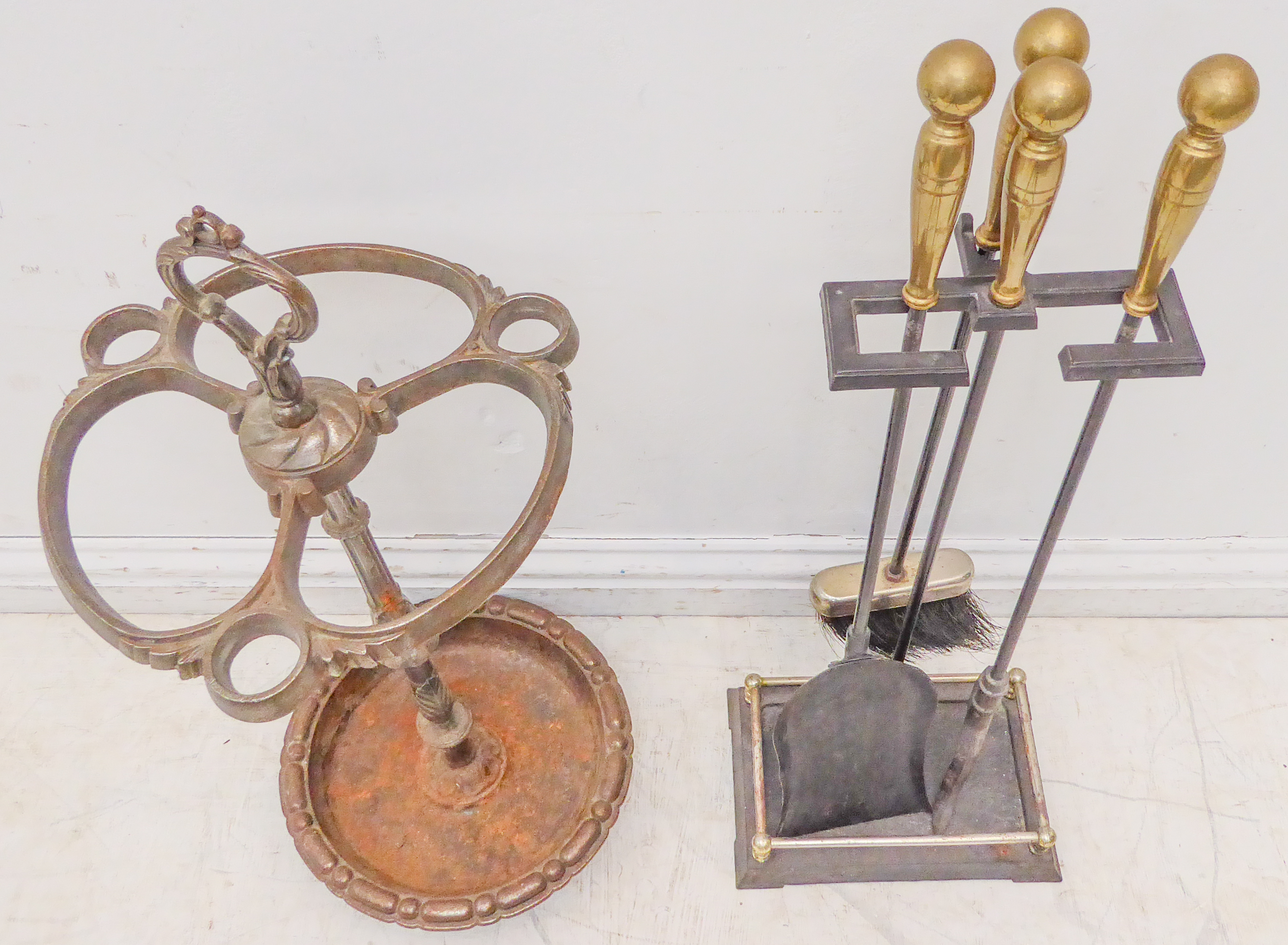 A four-piece iron and brass-handled fire-iron set, together with a sectional iron umbrella and stick - Image 2 of 2