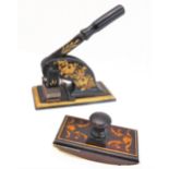 An early 20th century desktop stamp and a 19th century treen blotter decorated with sprigs (12 cm)