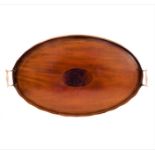 A circa 1900 oval mahogany serving tray with metal handles (56 x 36 cm)