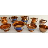 A selection of 19th century Welsh-style copper lustre comprising five jugs (the largest being 15