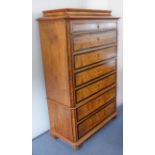 A fine 19th century continental figured walnut semainier: the unusual pagoda-style waisted top above