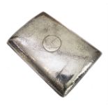 A heavy hallmarked silver hand-planished cigarette case with gilded interior: the circular cartouche