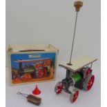 A Mamod model steam tractor: boxed, in good condition, and with accessories