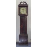 An early 19th century oak-cased 13-hour longcase clock: the broken swan-neck pediment above an 11-