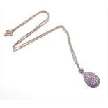 A pear-shaped silver pendant set with a multitude of varying sized hand-cut pink and white stones,
