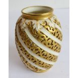 A late 19th century Royal Worcester China Works gilt-highlighted and reticulated porcelain vase,