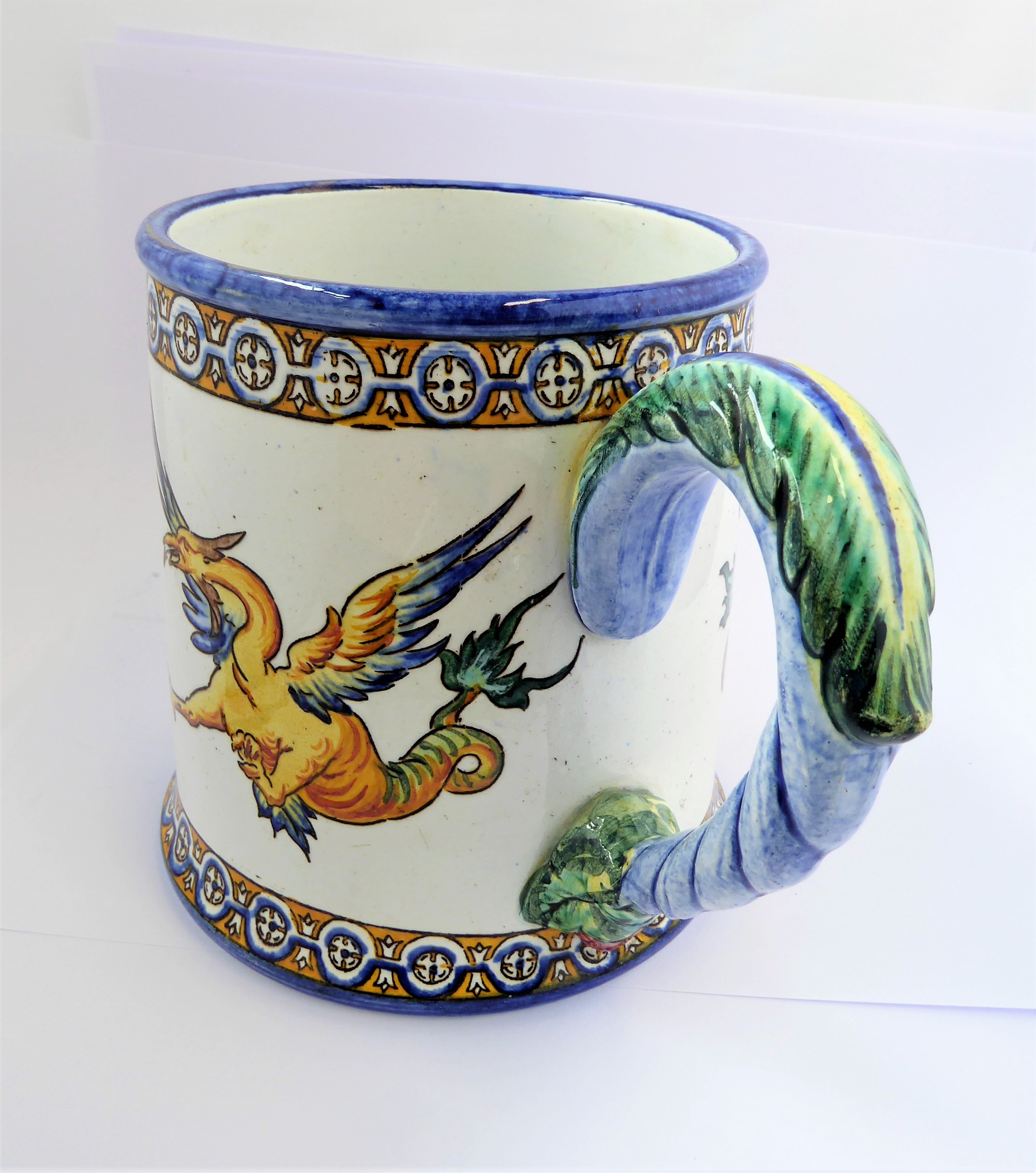 A 19th century faience mug by Gien, bearing mark for 1866 (10.5 cm high).  (See p13  'Faience de - Image 5 of 7