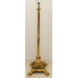 A heavy brass lamp standard modelled as a corinthian column with acanthus capitals, reeded stem