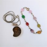 Silver necklace marked .925 set with an ammonite and a small stone set bracelet