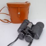 A pair of leather-cased field glasses by Leisure Arts (12 x 50 coated optics)