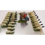 26 toy lead sheep (7 grazing, 9 lying down and 10 walking) and a Britain's Ltd jousting figure (