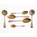 Six silver spoons: a pair of 19th century hallmarked silver dessert-spoons with gilded bowls and