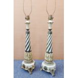 A pair of cream painted and brass floor standing lamps: each with turned tapering wrythen stem above
