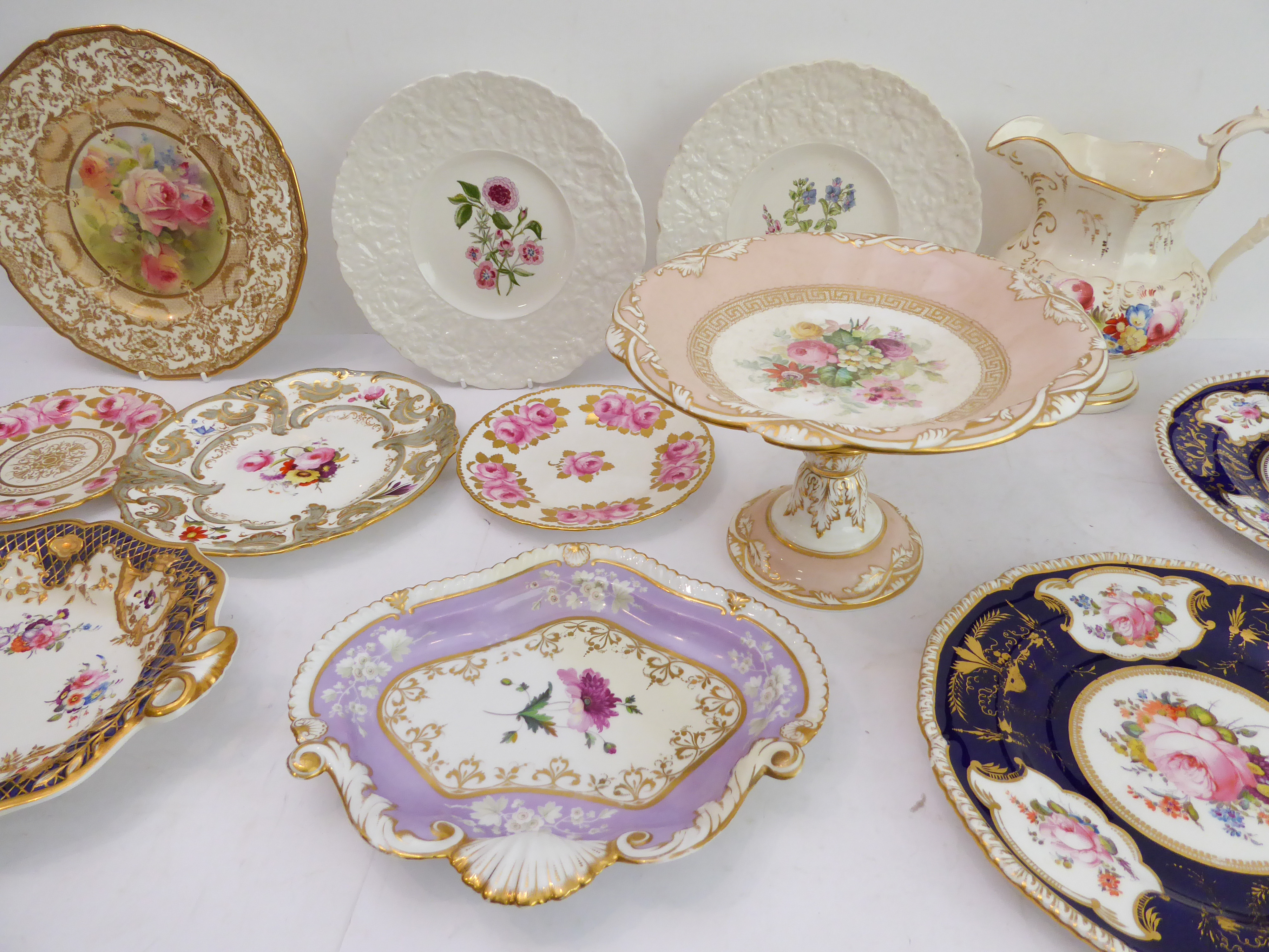 A good selection of mostly 19th century china to include: a mid-19th century gilded jug, hand-