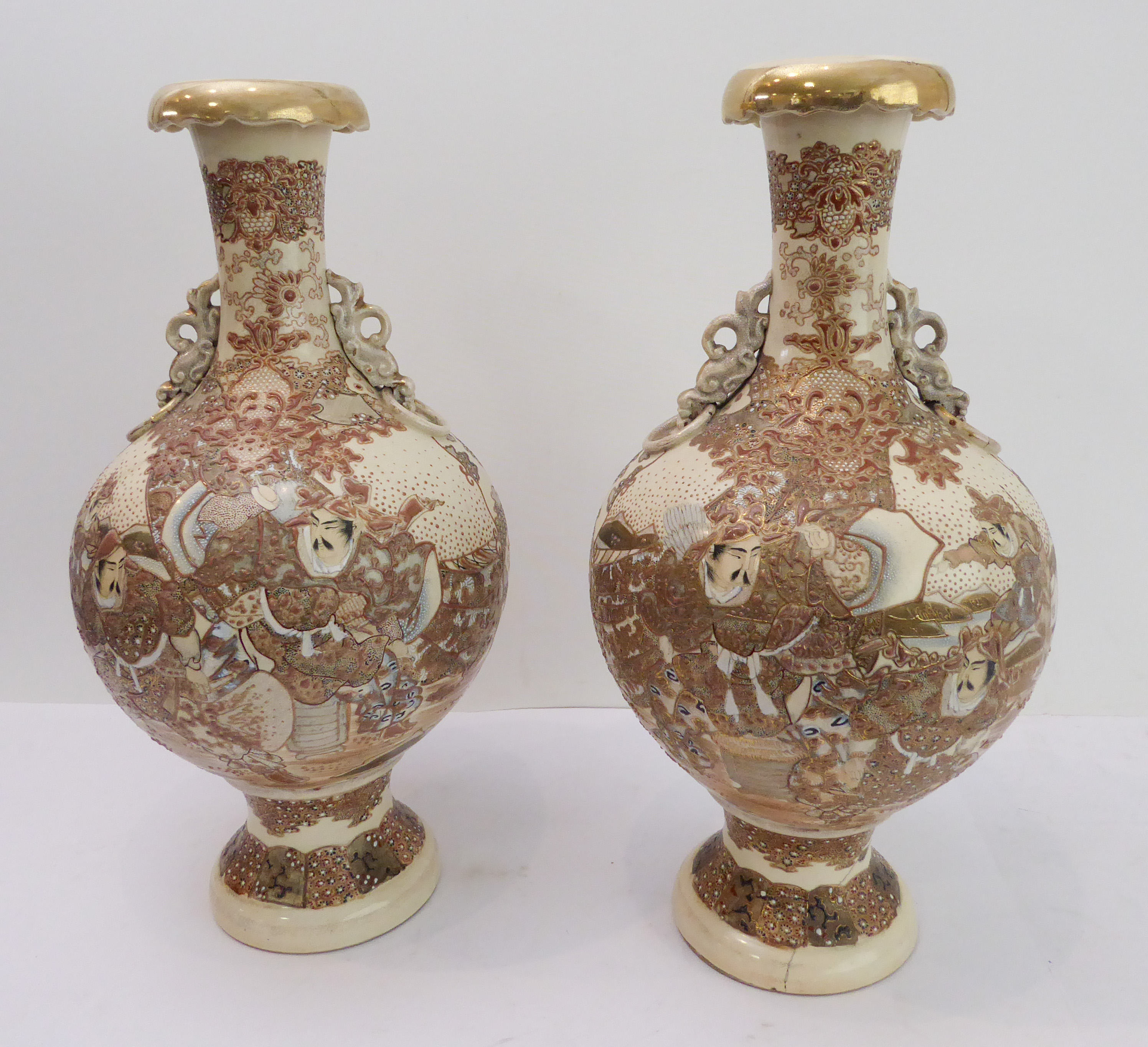 A large pair of early 20th century Japanese satsuma-style pottery vases. Each with overhanging