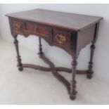 An early 20th century oak side table in late 17th century william & Mary style: the slightly