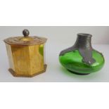 Two early 20th century pieces: 1. an Art Nouveau green glass vase of squat bun form, the neck with