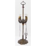 A 19th century rise-and-fall oil lamp (now converted to electricity)