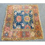 A small early 20th century North West Persian rug: cobalt-blue and lighter rectangular ground with