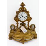 A fine 19th century gilt-metal and porcelain mounted eight-day mantle clock: the floral surmount